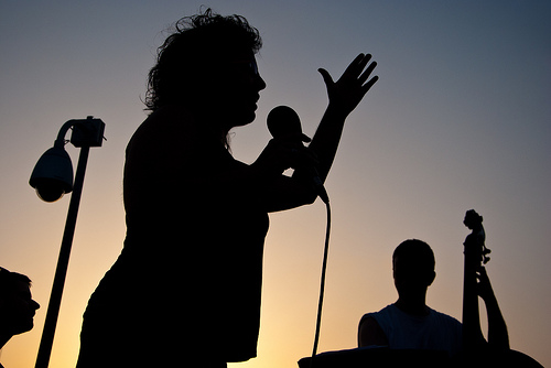 silhouette-of-a-woman-singing